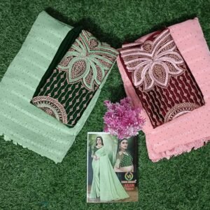 Pastel green and blush pink sarees with heavy embroidered contrast blouses in dark green and maroon, laid on grass background with product catalog.